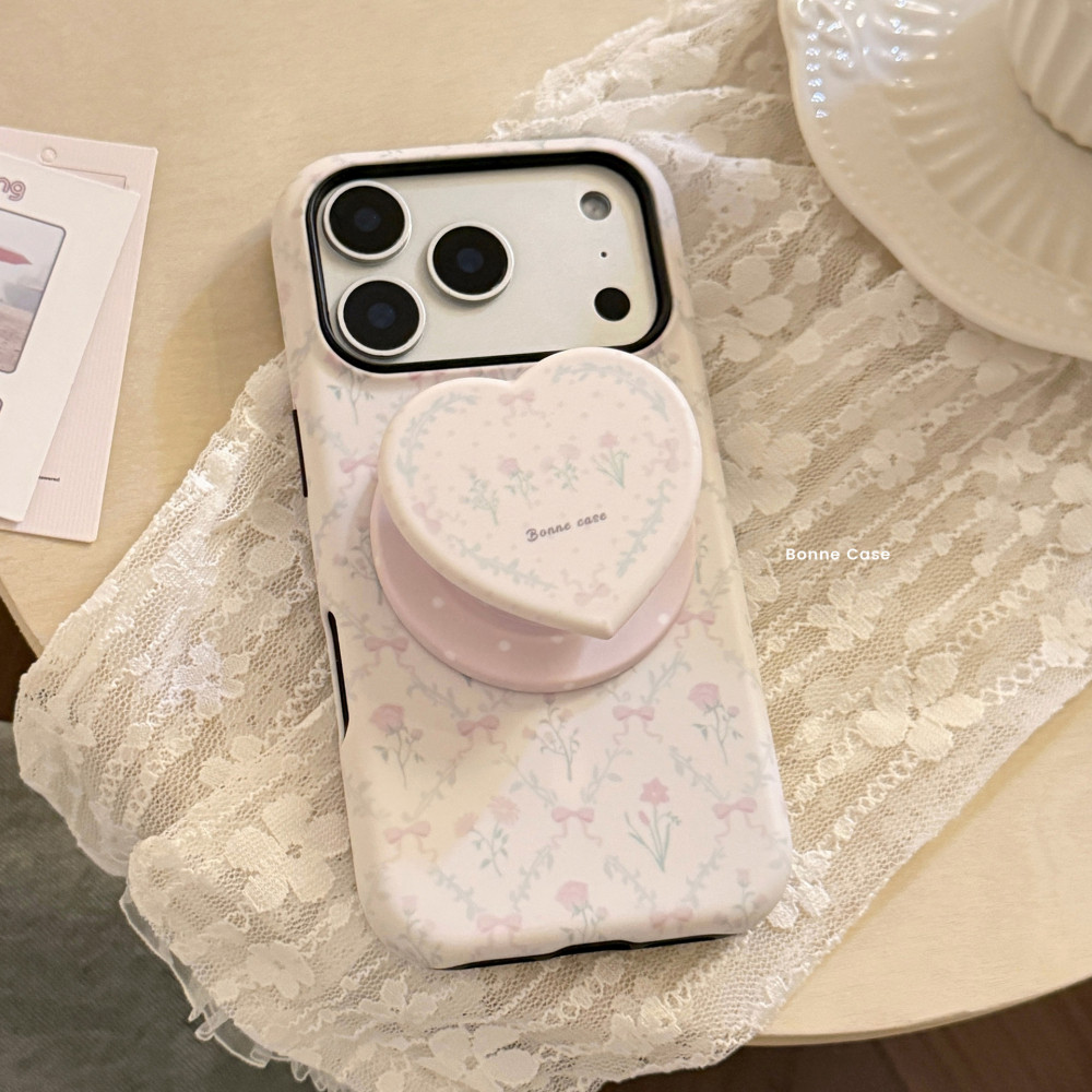 InsสีชมพูBowknotดอกไม้ดอกไม้รูปหัวใจScalableแม่เหล็กผู้ถือIPhoneสําหรับIPhone 17 Pro Max 17 Pro 17 Air 17 16 15 14 13 Anti Drop Hard PCปกหลัง