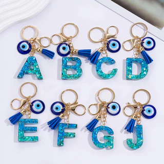 St.kunkka พวงกุญแจตัวอักษร A-Z เรซิ่น Evil Eye ดวงตาปีศาจ เครื่องรางนำโชค พร้อมพู่ สไตล์เกาหลี สำหรับห้อยกระเป๋า ของขวัญ