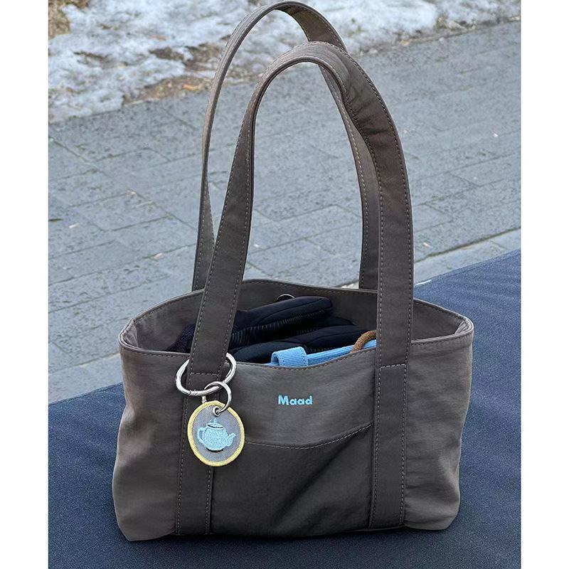 กระเป๋าบากเกตต์ผู้หญิง ทรง tote สะพายข้าง สไตล์ casual สำหรับการเดินทาง