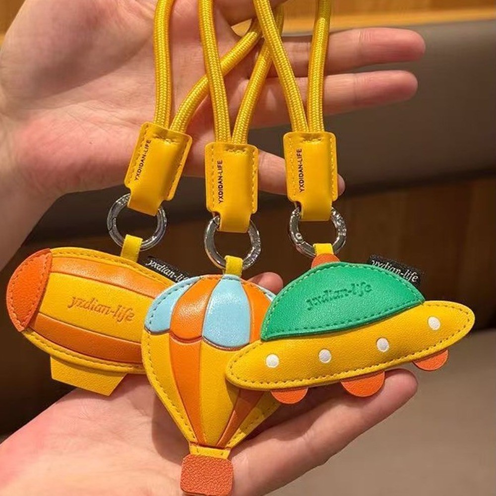 Creative PU หนัง Airship พวงกุญแจแฟชั่น Flying Saucer พวงกุญแจกระเป๋าถือจี้เครื่องประดับของขวัญ