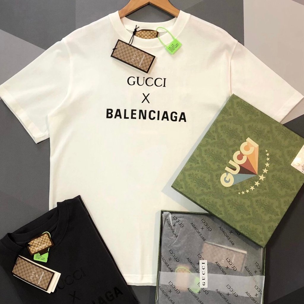 Gucci สไตล์ใหม่ GUCCI Balenciaga แขนสั้นผู้ชาย Street Wear Gucci Joint Spray Paint Graffiti พิมพ์ตัว