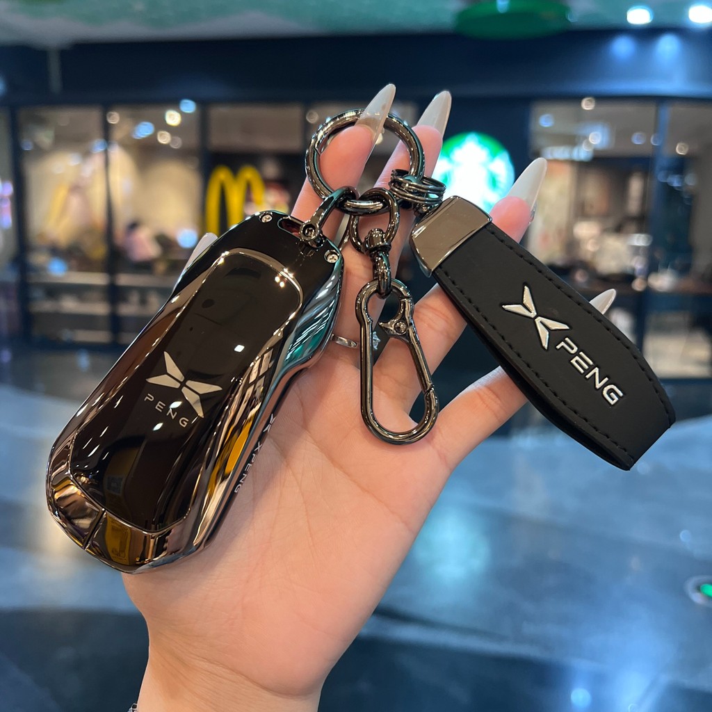 เฉพาะ 2026 XPENG X9 ฝาครอบกุญแจใหม่ XPENG X9 2026 รถอุปกรณ์เสริมจี้ Anti-Lost ชายกระเป๋าหัวเข็มขัดหญิง
