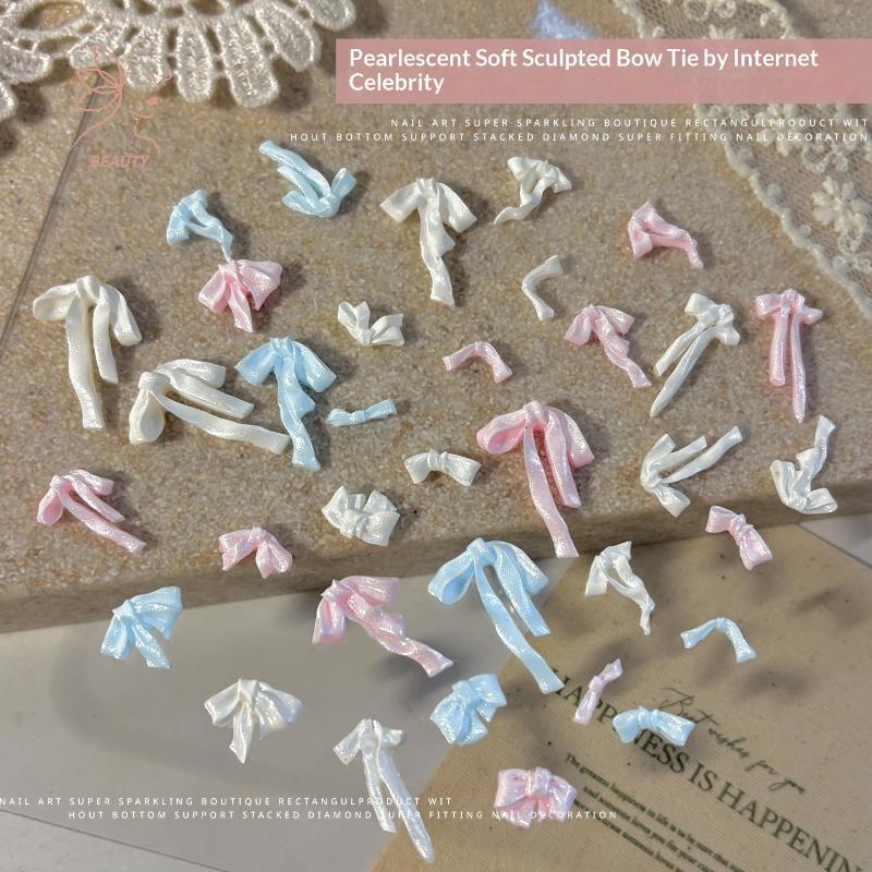 [maybeauty] 50 ชิ้น Bowknot ตกแต่งเล็บ 3D ซาตินเล็บ Charms ริบบิ้นที่มีสีสันโบว์ Rhinestone DIY เล็บเครื่องมืออุปกรณ์เสริม {TH}