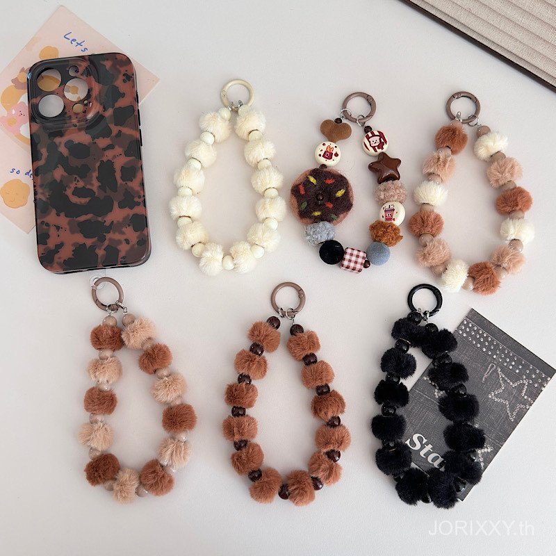 ฤดูใบไม้ร่วงฤดูหนาวรูปแบบใหม่ลูกขนลูกปัดโดนัทจี้เคสโทรศัพท์กระเป๋าเครื่องประดับสั้นโทรศัพท์มือถือสายรัดข้อมือเชือกเส้นเล็ก