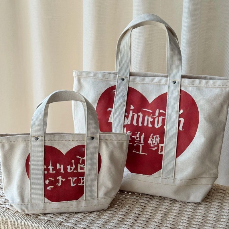 HUMAN Heart Polaris กระเป๋าถือหนังแท้ canvas สำหรับใช้นอกบ้านและของขวัญวันวาเลนไทน์