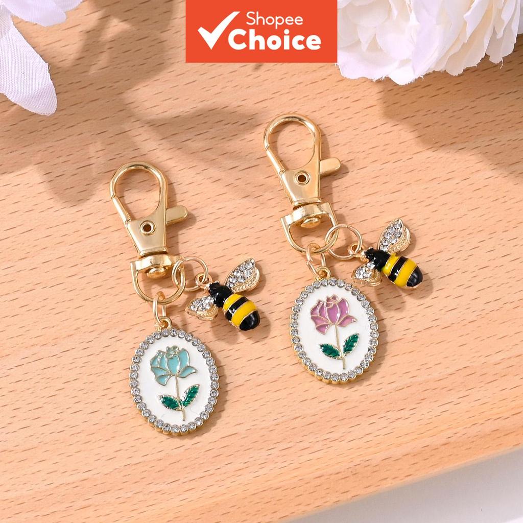 ฝรั่งเศสประณีตเพชรล้อมรูปไข่ยี่ห้อ Rose Bee พวงกุญแจกระเป๋าหูฟังเคสโทรศัพท์ตกแต่งรถ Best Friend จี้ 2 ganungan kunci gantungan tas ของขวัญสําเร็จการศึกษา ราคา ถูกที่สุด ดีลบีเคเค รูปภาพหลัก