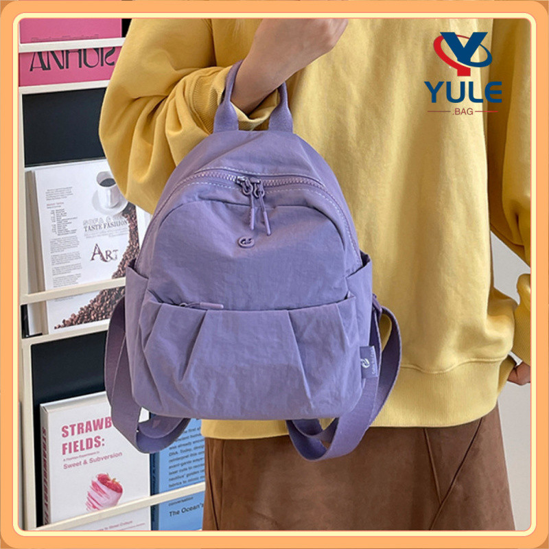 YULE กระเป๋าเป้สะพายหลังไนลอนหญิงกันน้ําป้องกันการโจรกรรม 0.28 กก. Ultra-Light Mini กระเป๋านักเรียนขนาดเล็กสามารถถือ iPad เหมาะสําหรับการเดินทางทุกวัน