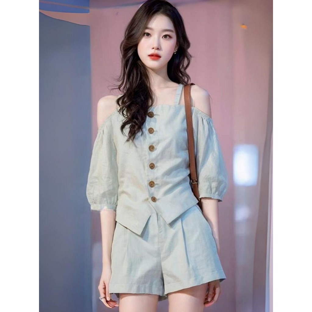 สไตล์ใหม่การจับคู่สีฟ้าอ่อนสไตล์เกาหลีที่ไม่มีสายหนังไหล่ข้างเดียวด้านบนกางเกงขาสั้นฤดูร้อนสูทที่สวยงามสีทึบหนึ่งชุดแ