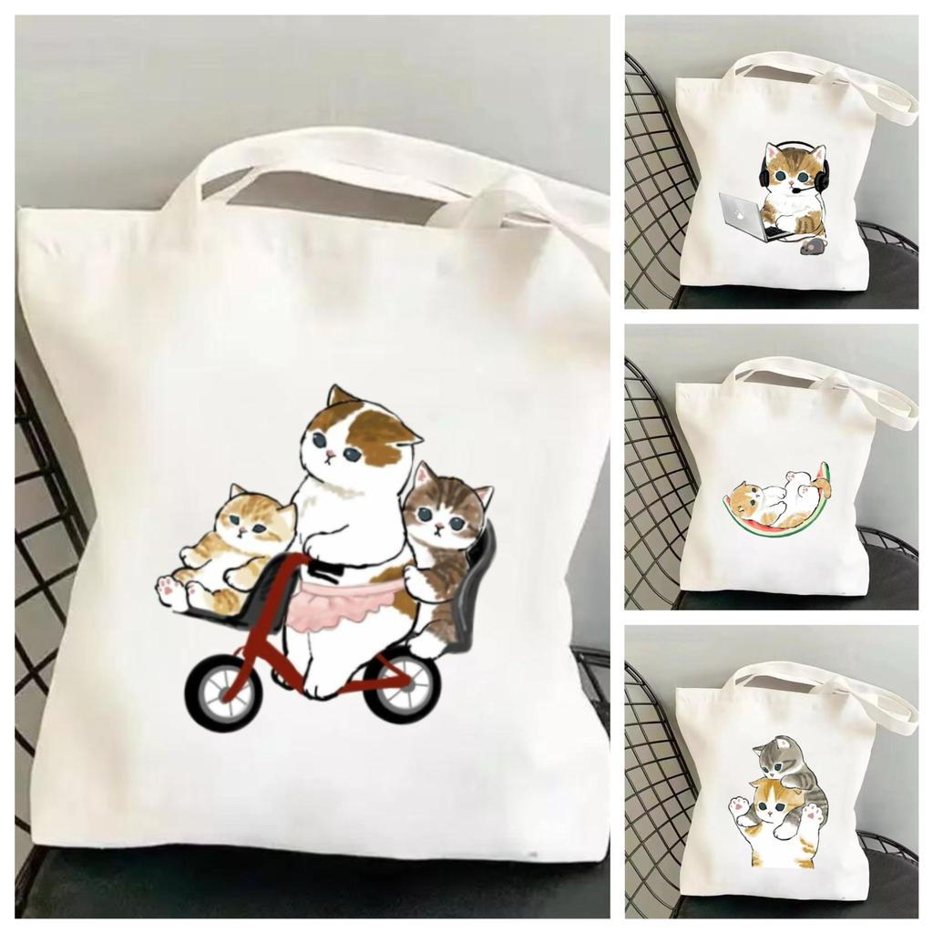 สินค้าใหม่: กระเป๋าผ้าทรงโท้ทลายแมวน่ารักสไตล์มินิมอล ความจุขนาดใหญ่ โดดเด่นด้วยลายพิมพ์สกรีนหลากหลายแบบ ขนาด: 34*37 ซม.