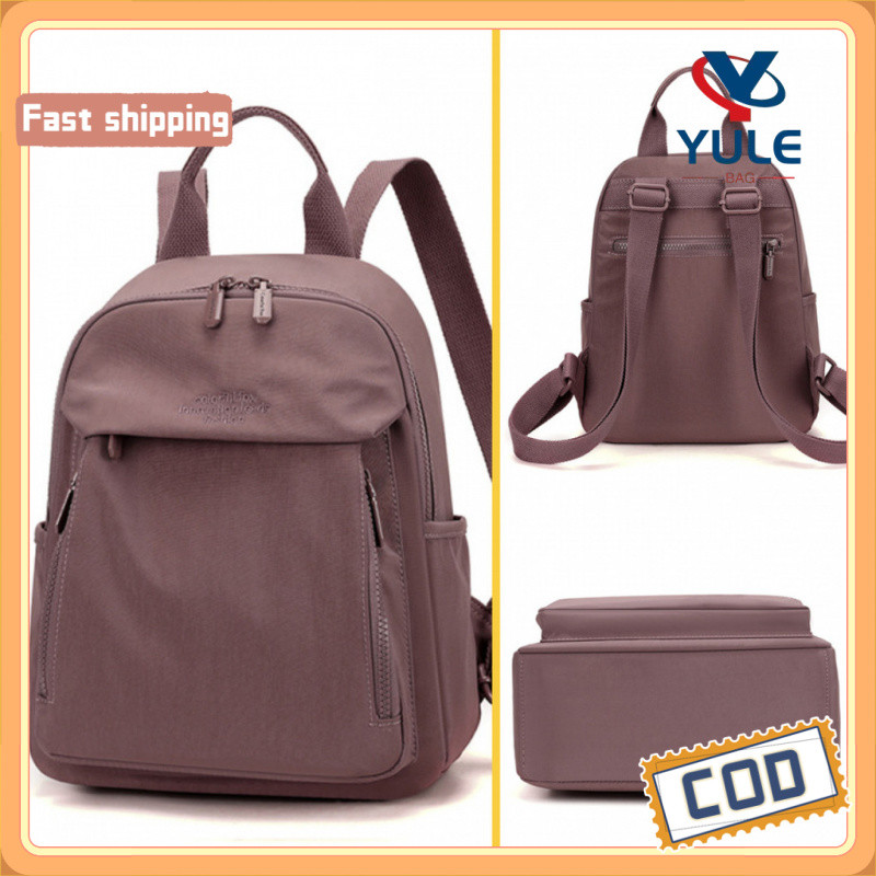 YULE กระเป๋าเป้สะพายหลัง Unisex ทำจากไนลอนกันน้ํา เหมาะสำหรับการเดินทางและทำงาน มีหลายช่องเก็บของ และสามารถใช้ใส่อุปกรณ์อย่าง iPad ราคา ถูกที่สุด ดีลบีเคเค แกลเลอรีภาพที่ 7