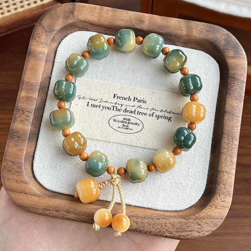 สร้อยข้อมือลูกพลับแกะสลักรากโพธิ์ธรรมชาติ กลมเล็ก หมายถึง "ดีที่สุดทั้งหมด"