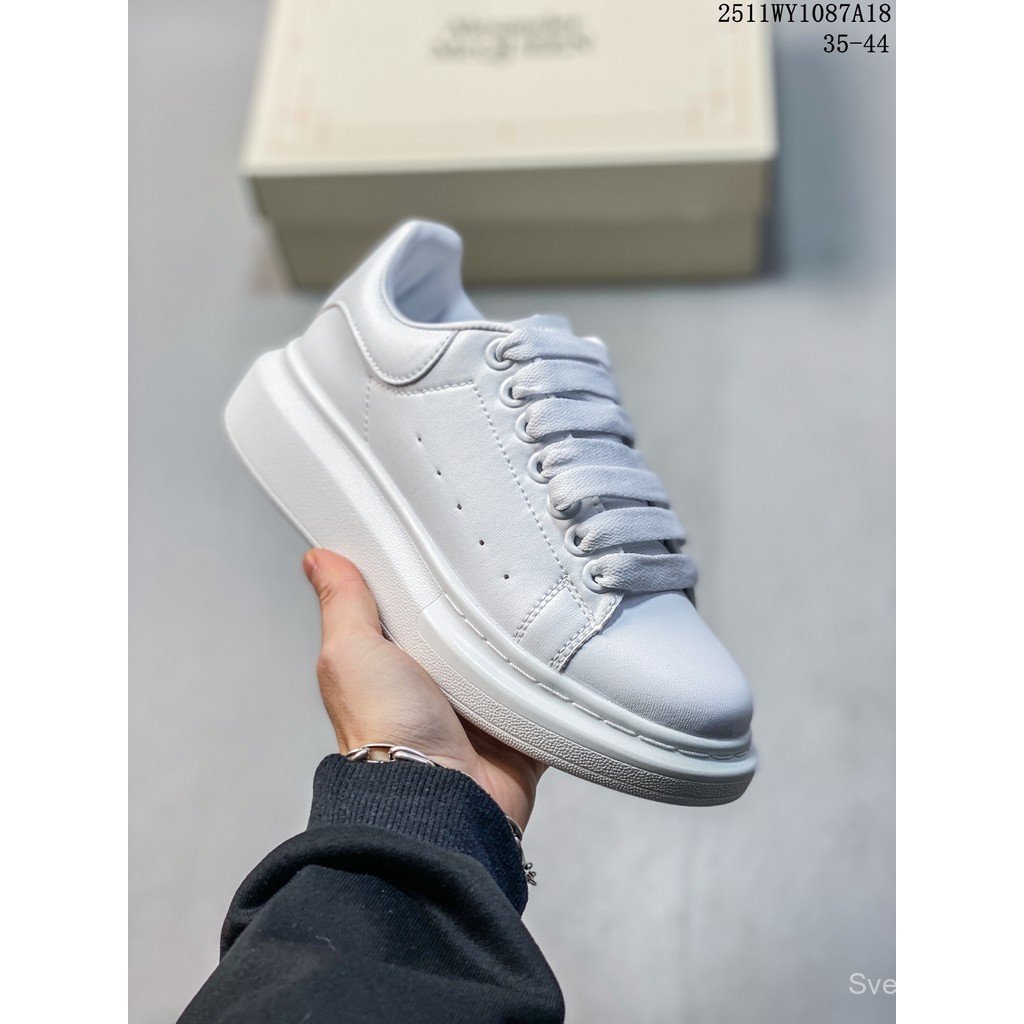 Alexander McQueen McQueen รองเท้าสีขาวสูญญากาศ High-Density ความสูงรองเท้าสีขาวหนังวัวเรียบรองเท้าผ้าใบแบบผูกเชือก D0