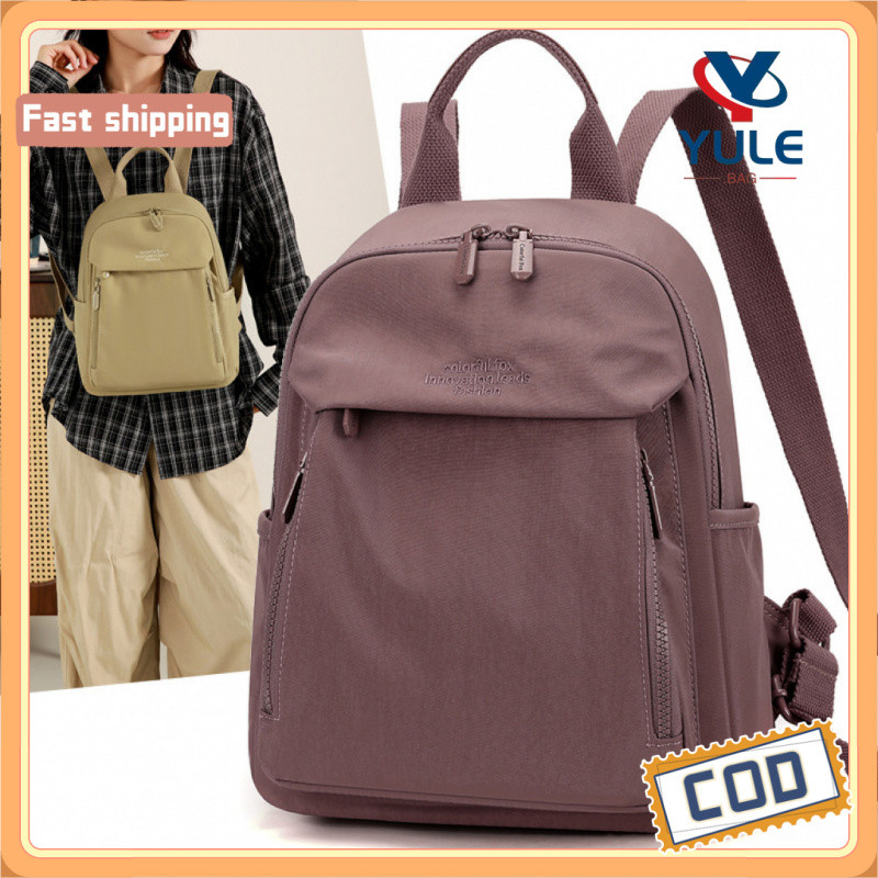 YULE กระเป๋าเป้สะพายหลัง Unisex ทำจากไนลอนกันน้ํา เหมาะสำหรับการเดินทางและทำงาน มีหลายช่องเก็บของ และสามารถใช้ใส่อุปกรณ์อย่าง iPad ราคา ถูกที่สุด ดีลบีเคเค รูปภาพหลัก