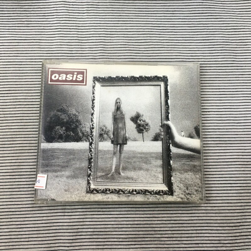 (แบบไม่ซีล ) 绿乐 Oasis – Wonderwall youzi ซีดีและหน้ากระดาษก็ดี
