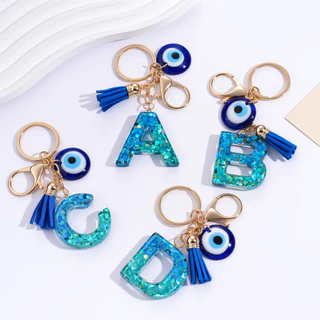 St.kunkka พวงกุญแจตัวอักษร A-Z เรซิ่น Evil Eye ดวงตาปีศาจ เครื่องรางนำโชค พร้อมพู่ สไตล์เกาหลี สำหรับห้อยกระเป๋า ของขวัญ