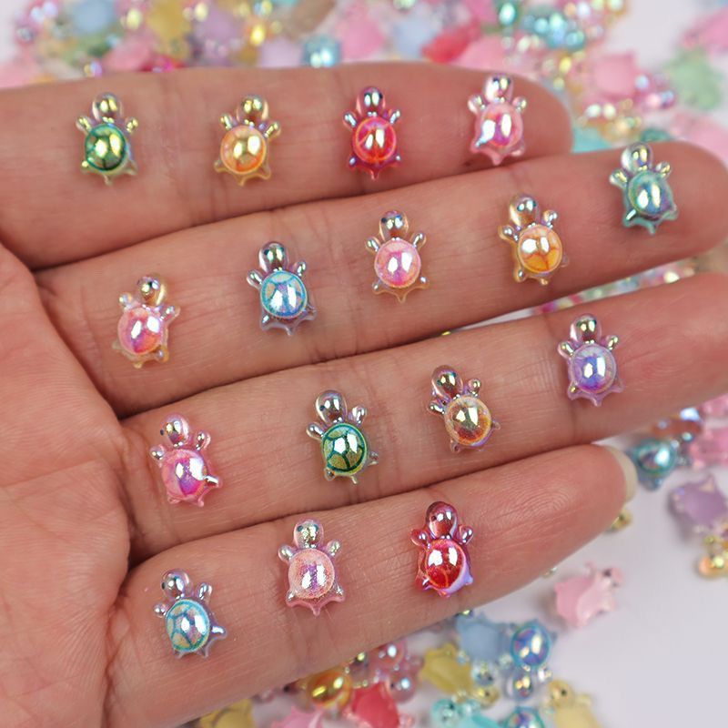 100 ชิ้นเล็บมินิเต่าชุบ Noctilucent สีสันน่ารักการ์ตูนเรซิ่นเล็บ Art DIY Charms ตกแต่ง
