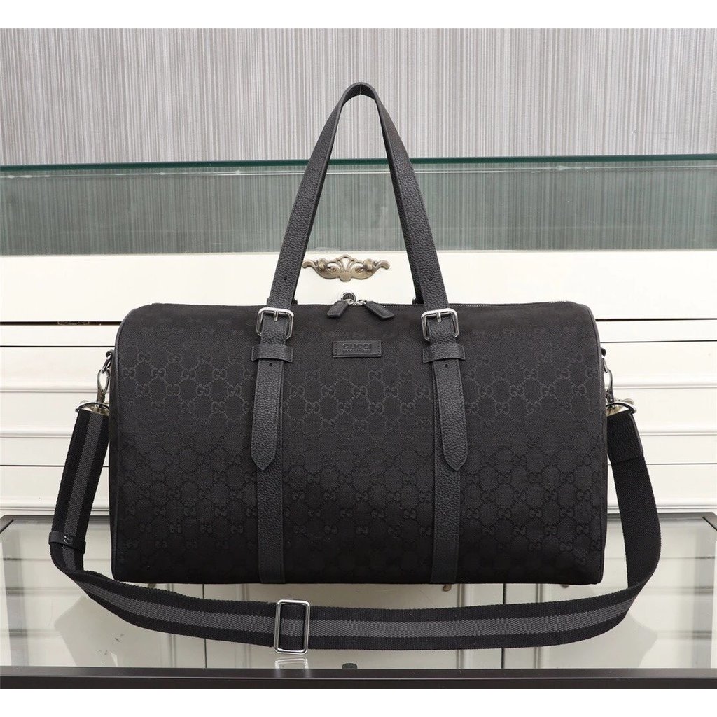 CUCCI (Gucci) สินค้ามาใหม่ใช้ผ้านําเข้าเพื่อทํากระเป๋าเดินทางความจุขนาดใหญ่ดีไซน์สดใสความงามที่ไม่ซ้
