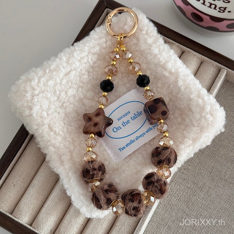 "Amber Crystal Candy" ฤดูใบไม้ร่วงฤดูหนาว Retro เสือดาวพิมพ์ Hot Girl Fur Ball โซ่โทรศัพท์มือถือที่ไม่ซ้ํากัน High-End คริสตัลโซ่สั้น