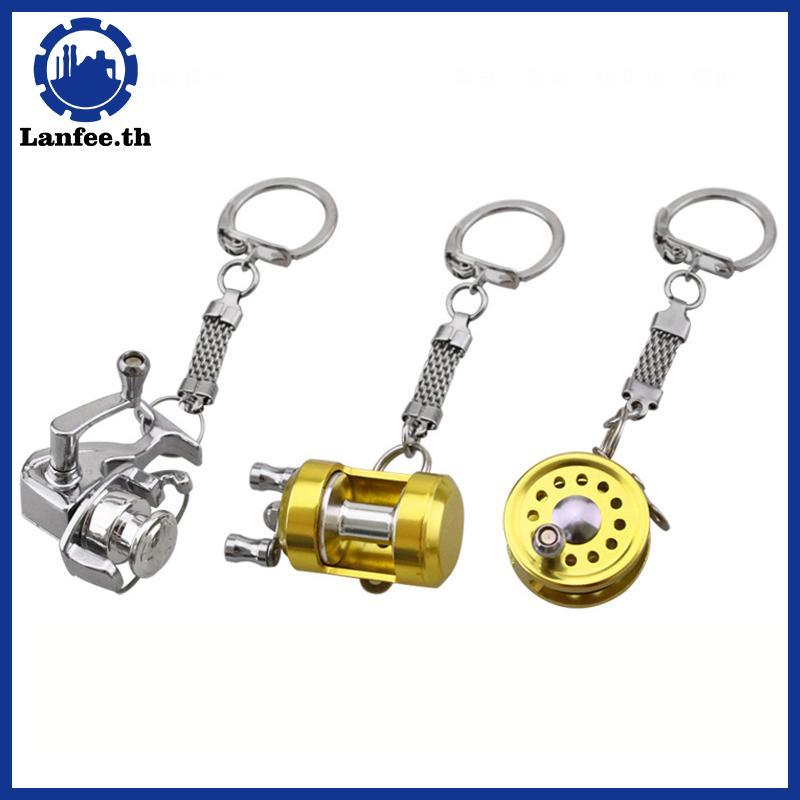 NFE 1 ชิ้นโลหะผสมตกปลา Reel กลองจี้พวงกุญแจล้อกลางแจ้ง Fishing Tackle N