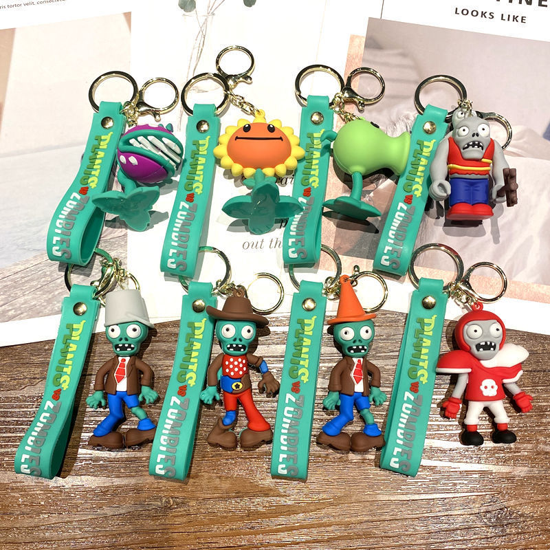 Plants vs Zombies ชุดพวงกุญแจ 8 ชิ้น, พวงกุญแจรถการ์ตูนน่ารักและกระเป๋า Charm อุปกรณ์เสริมของขวัญสําหรับเด็กเด็กผู้หญิง