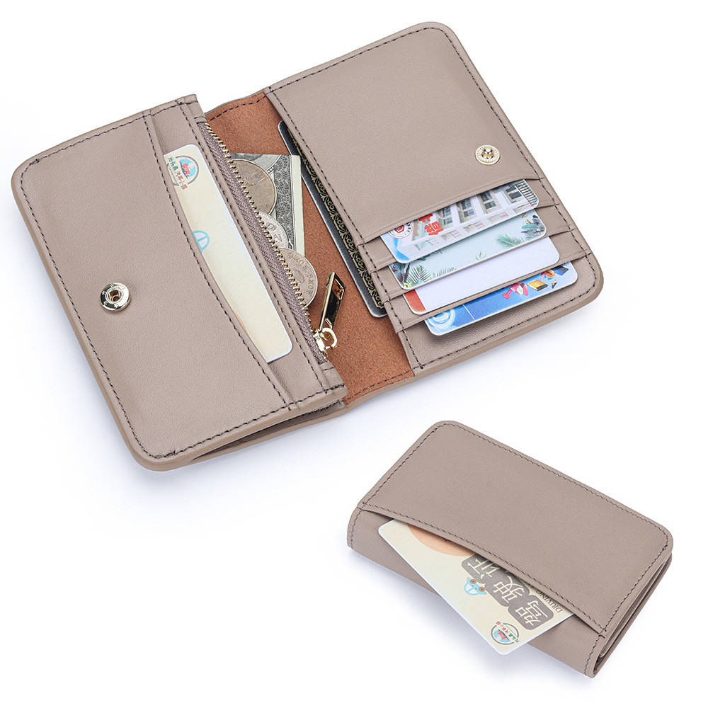 กระเป๋าสตางค์ใบสั้นหนังวัวสำหรับสุภาพสตรี พร้อมช่องเสียบการ์ดหลายช่อง และลาย Nepali