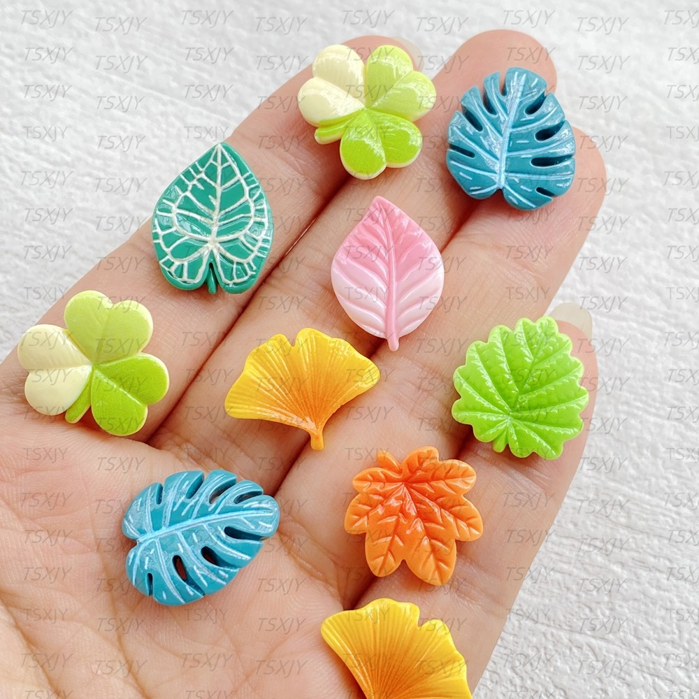 อุปกรณ์เรซิ่น 20 ชิ้น น่ารัก ลายการ์ตูน ผสมสี ใบแบนกลับ ดอกไม้หิน ใช้ในการทำสมุดภาพ และรูปแกะสลัก