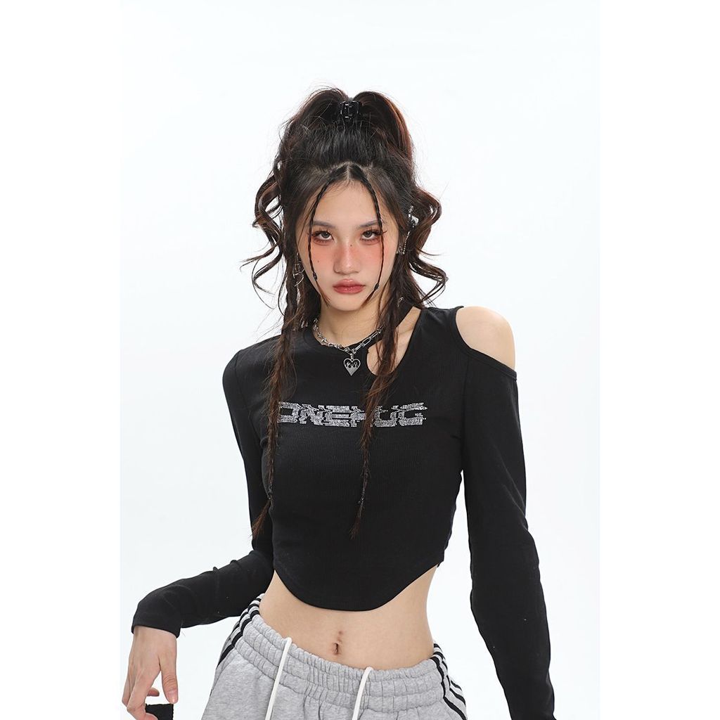 ฤดูใบไม้ร่วงหวานเย็นสาวร้อน Hollow พิมพ์รอบคอที่ไม่มีสายหนังแขนยาวเสื้อยืดผู้หญิง Slimmer ดูการออกแบ