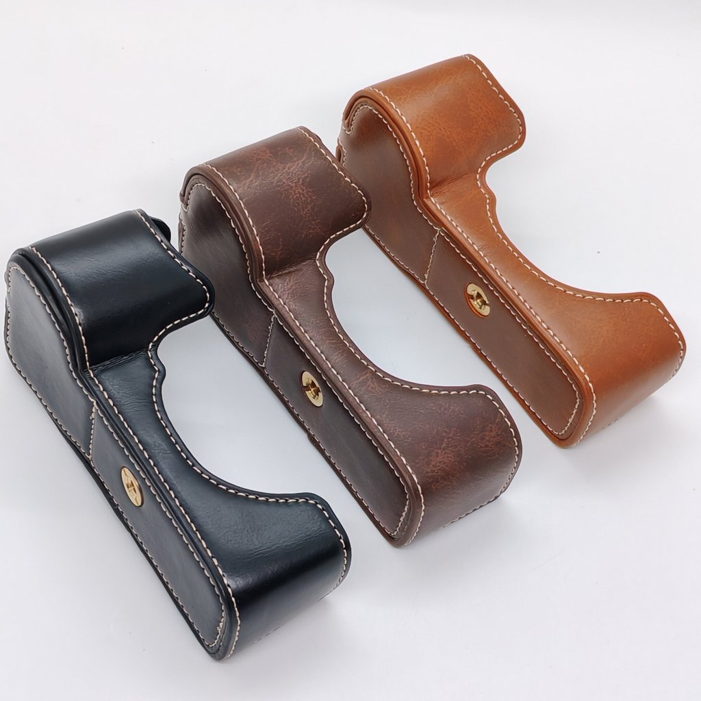 เหมาะสําหรับ Sony Micro กล้องเดี่ยว A72 เคสป้องกัน A7II เคสหนัง a72 ครึ่งฐานเคสฐานกล้องเคสป้องกัน