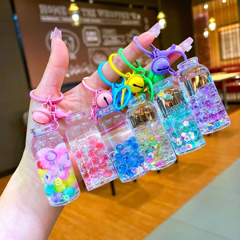 Creative Drift ขวด Glow-in-the-Dark Bubble ลูกปัดไหลทรายสูงขวดพวงกุญแจจี้ตุ๊กตาของขวัญ