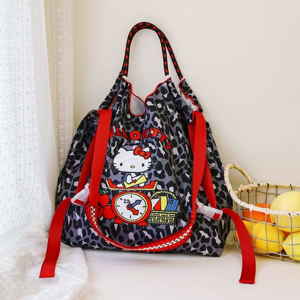 กระเป๋าช้อปปิ้งที่เป็นมิตรกับสิ่งแวดล้อมปักลาย Hello Kitty|กระเป๋าผ้าไนล่อนลายเสือดาวญี่ปุ่น|ขนาดใหญ่-ความจุ Commuter ไหล่เดียว Cross-Body ball chain Cross-Body Tote Bag