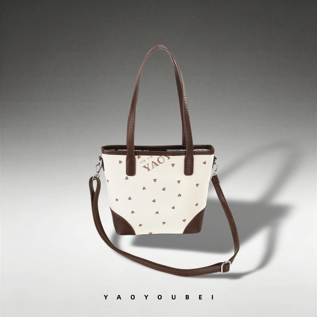 YAOYOUBEI กระเป๋าถือดีไซน์เกาหลี ลายหัวใจเก๋ไก๋ — คุณภาพพรีเมียม ทุกรายละเอียดประณีต ดีไซน์มินิมอล ใส่ของจุใจ