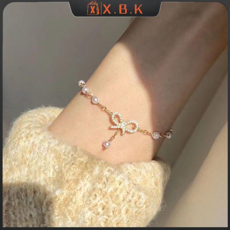 XBK สร้อยข้อมือ charm คริสตัลโบว์ สไตล์แฟชั่นสำหรับผู้หญิง พร้อมใช้งานในงานปาร์ตี้หรือเป็นของขวัญพิเศษ