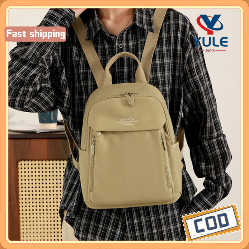 YULE กระเป๋าเป้สะพายหลัง Unisex ทำจากไนลอนกันน้ํา เหมาะสำหรับการเดินทางและทำงาน มีหลายช่องเก็บของ และสามารถใช้ใส่อุปกรณ์อย่าง iPad ราคา ถูกที่สุด ดีลบีเคเค แกลเลอรีภาพที่ 2