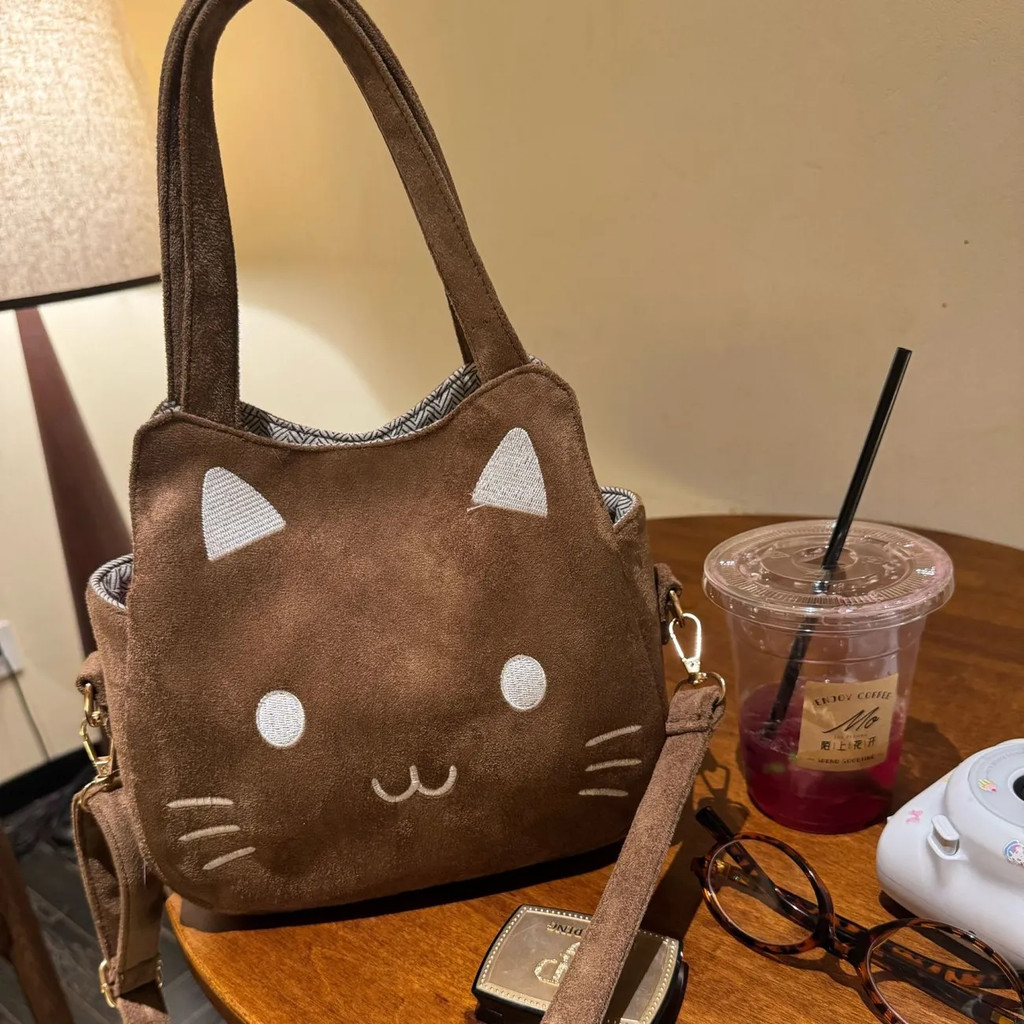 แมวน่ารักกระเป๋า Messenger หญิง 2026 สไตล์ใหม่การ์ตูนกระเป๋าสี่เหลี่ยมเล็ก High-End Niche Outing Commuter กระเป๋าสะพาย