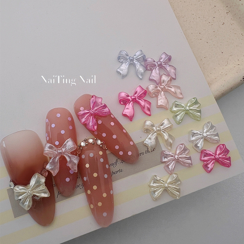 10 ชิ้น INS Simple Pearlescent ผ้าไหมโบว์ Streamer Candy ครีม Bow Tie สามมิติเล็บอุปกรณ์เสริมเรซิ่น Patch