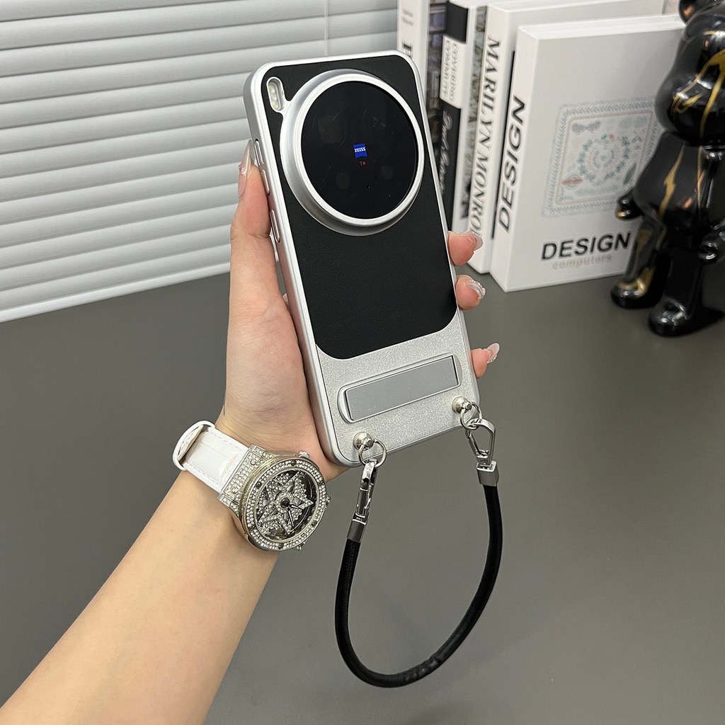 หนังธรรมดากราไฟท์สายคล้องมือสีดํา] เหมาะสําหรับ vivox300pro/x200ultra เคสโทรศัพท์สไตล์ใหม่ส่วนบุคคล High-End Shock-resistant รวมทุกอย่างเคสผู้ชายผู้หญิงธุรกิจ