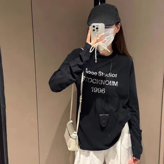 KYO 🌸 【พร้อมส่ง】ดำแฟชั่น เสื้อยืดเเขนยาว ผู้หญิง พิมพ์ลาย "AOOE STUDIOS" OVERSIZE ผ้าCOTTON ไม่ต้องรีด