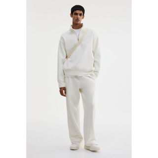 H&M(เอชแอนด์เอ็ม) เสื้อซับในแบบหลวมที่มีซิปเปิดปิดด้านบน ผู้…