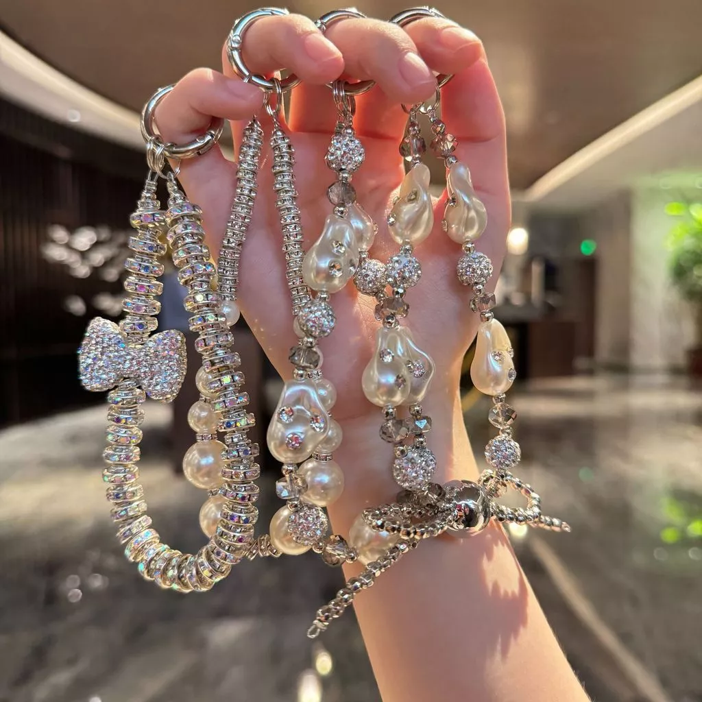 SAMSUNG แฟชั่นคริสตัลแหวนมือสายรัดข้อมือเชือกเส้นเล็ก พลอยเทียม สําหรับ ไอโฟน หัวเว่ย เรดมี่ เสี่ยวหมี่ ซัมซุงโทรศัพท์เสน่ห์เพชรโบว์สร้อยข้