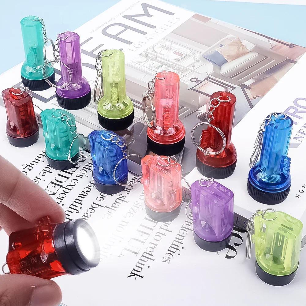 พวงกุญแจไฟฉาย LED ขนาดเล็ก Ultra-Bright Long-Range สำหรับเดินป่าและฉุกเฉิน