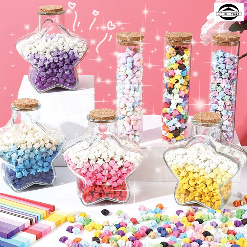 ดาวนำโชคแบบพับกระดาษระยิบระยับ มีให้เลือกหลายสีไล่ระดับ ดาวแห่งพรที่ทำด้วยมือ เหมาะสำหรับตกแต่งและมอบเป็นของขวัญ