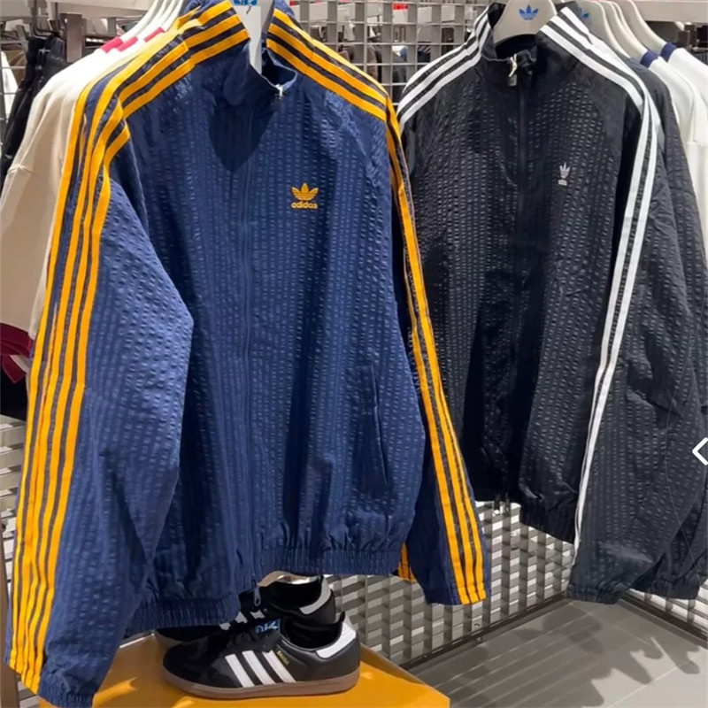 ปักโลโก้เสื้อแจ็คเก็ตผู้ชายวินเทจแบบบางคอตั้งเสื้อโค้ทคลาสสิกลายทางลําลอง