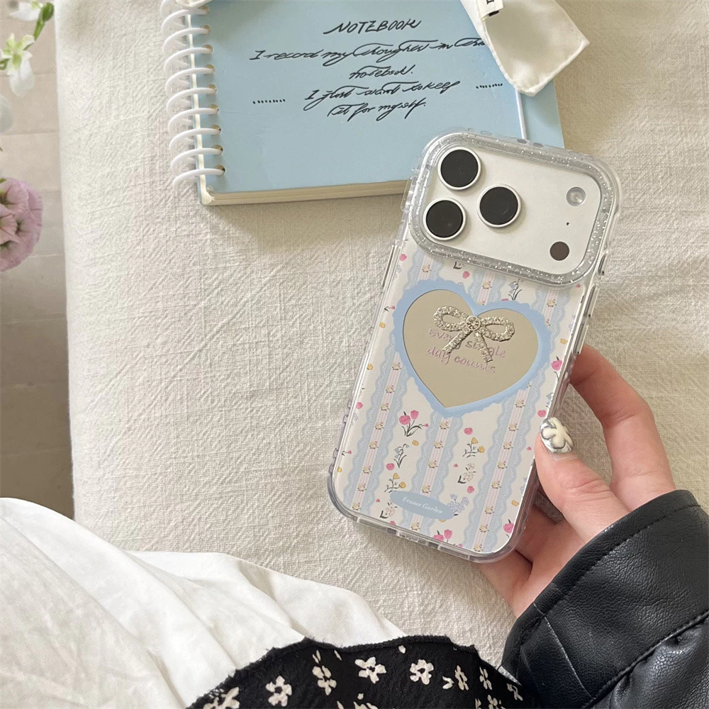 น่ารักหรูหราโบว์หัวใจกระจกเคสโทรศัพท์สําหรับiPhone 16 ProกรณีiPhone 15 17 16 Pro Max 17Promaxเกาหลีดอกไม้ที่มีสีสันกันกระแทกปกอ่อนFundas