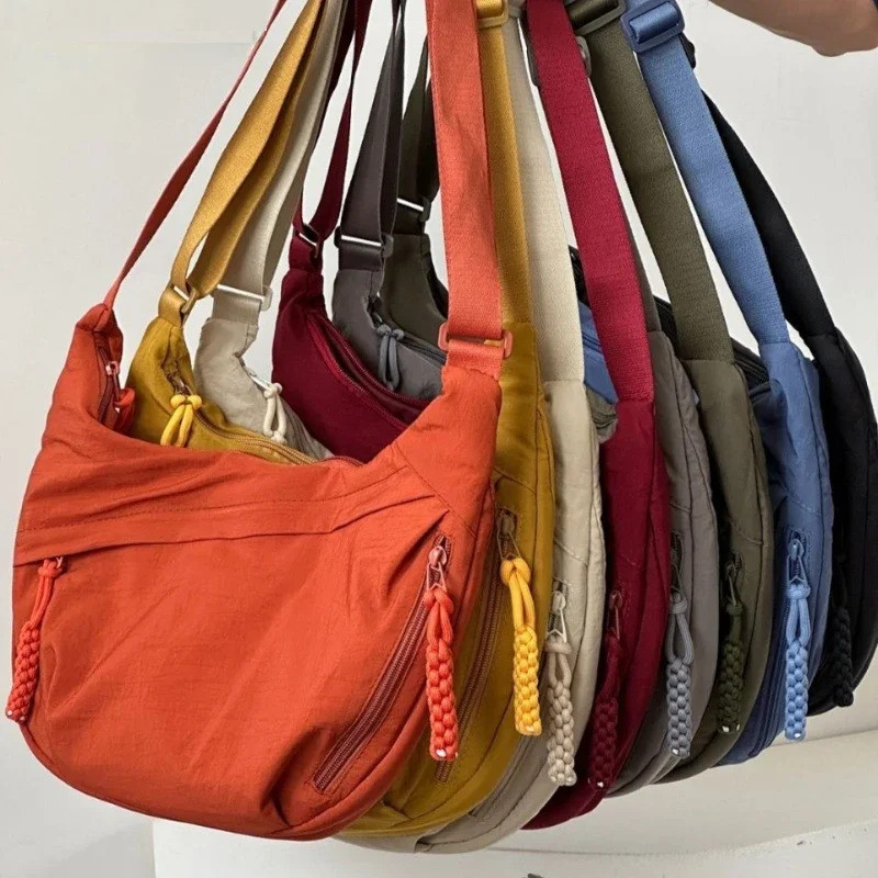 Soft fabric shoulder bag for women. Modern design, solid color, casual style for students. Large han