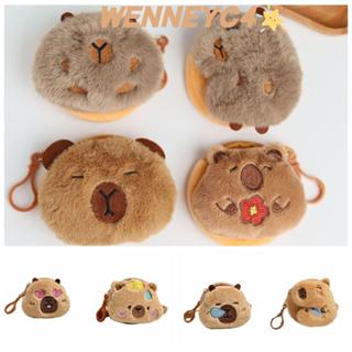 กระเป๋าใส่เหรียญวันเนยู พวงกุญแจการ์ตูน และกระเป๋าใส่หูฟังขน…