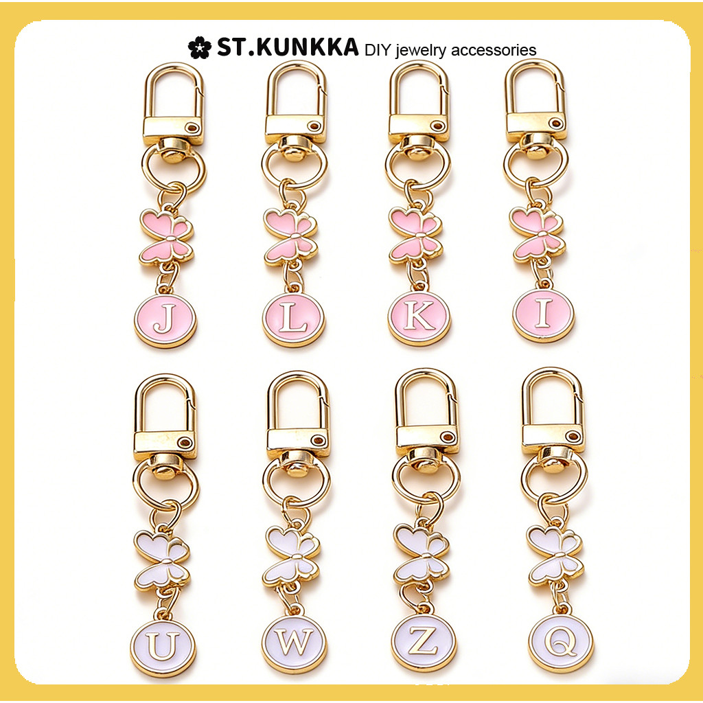 St. kunkka พวงกุญแจตัวอักษรผีเสื้อสีขาวสีชมพูจี้โลหะผสมน่ารักพวงกุญแจสาวของขวัญเครื่องประดับขนาดเล็ก