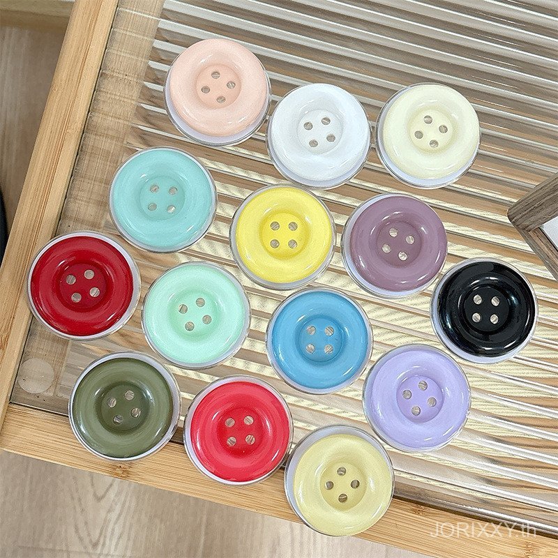 ปุ่มสีลูกกวาดหดเบาะลมแหวนโทรศัพท์มือถือที่วางถุงลมนิรภัยแม่เหล็กเดสก์ท็อปสนับสนุนอุปกรณ์นิชตกแต่ง