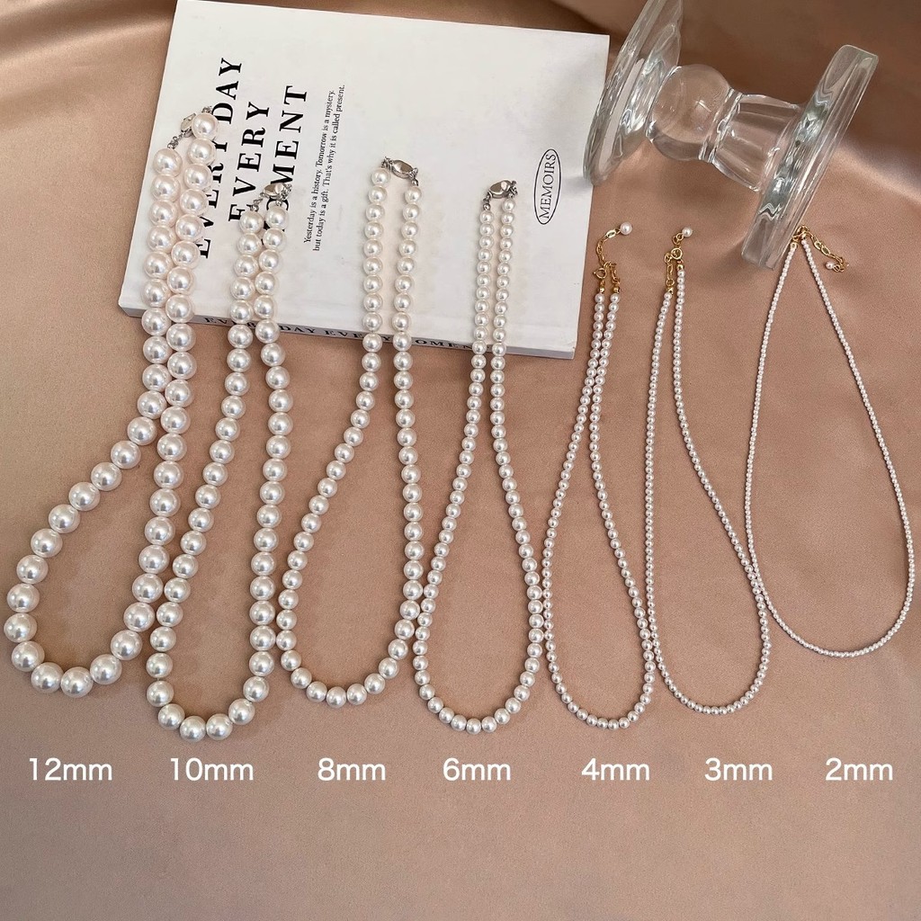 ของแท้รอบ 650 Pearl White Shijia Pearl สร้อยคอไทเทเนียมเหล็ก Ingot Buckle อุปกรณ์เสริมหญิงหรูหรา Nic