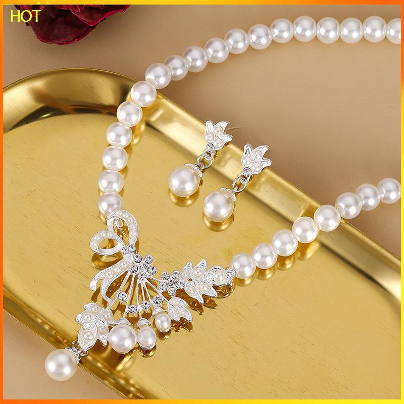 Technicolorsuper ดอกไม้ทรงหยดน้ําชุดต่างหูสร้อยคอมุกยุโรปและอเมริกาชุดอารมณ์หญิงสร้อยคอต่างหู TSR