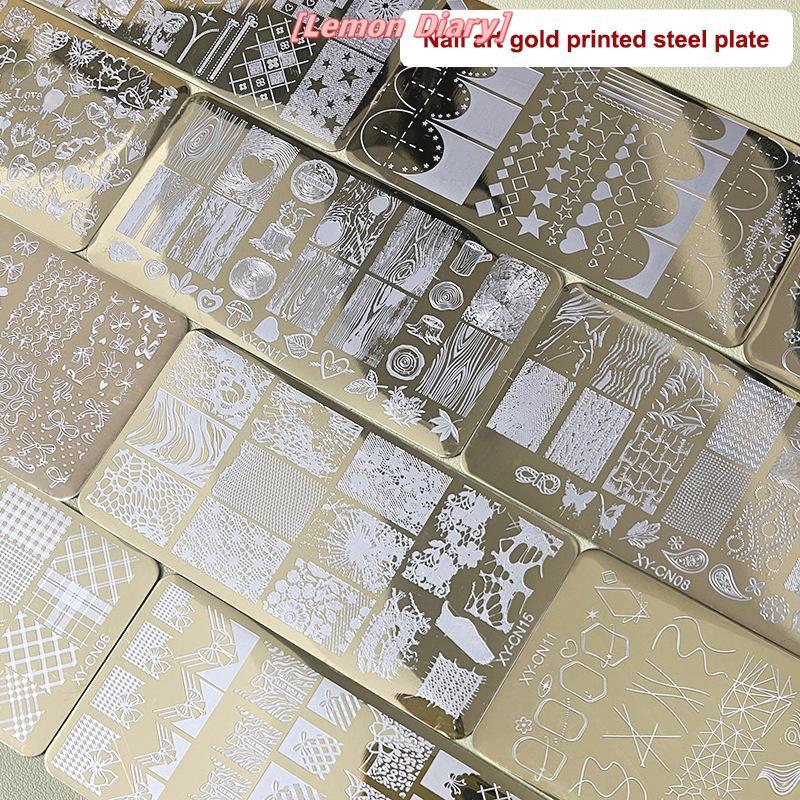 แอลดี| 12x6 ซม.Golden รูปสี่เหลี่ยมผืนผ้าเล็บปั๊มแผ่น Bowknot ผีเสื้อดอกไม้แมวออกแบบเล็บแม่แบบสําหรับ DIY ตกแต่งเล็บ Stencils สแตนเลสใหม่